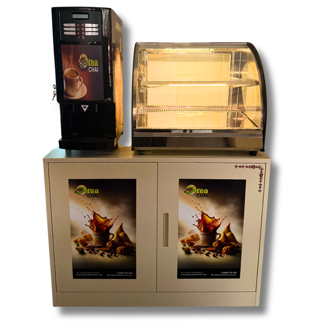 Coffee machine and display case with Spiced Tea Chai branding on a white background